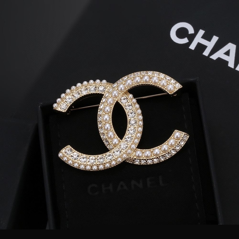 Ch*el brooches